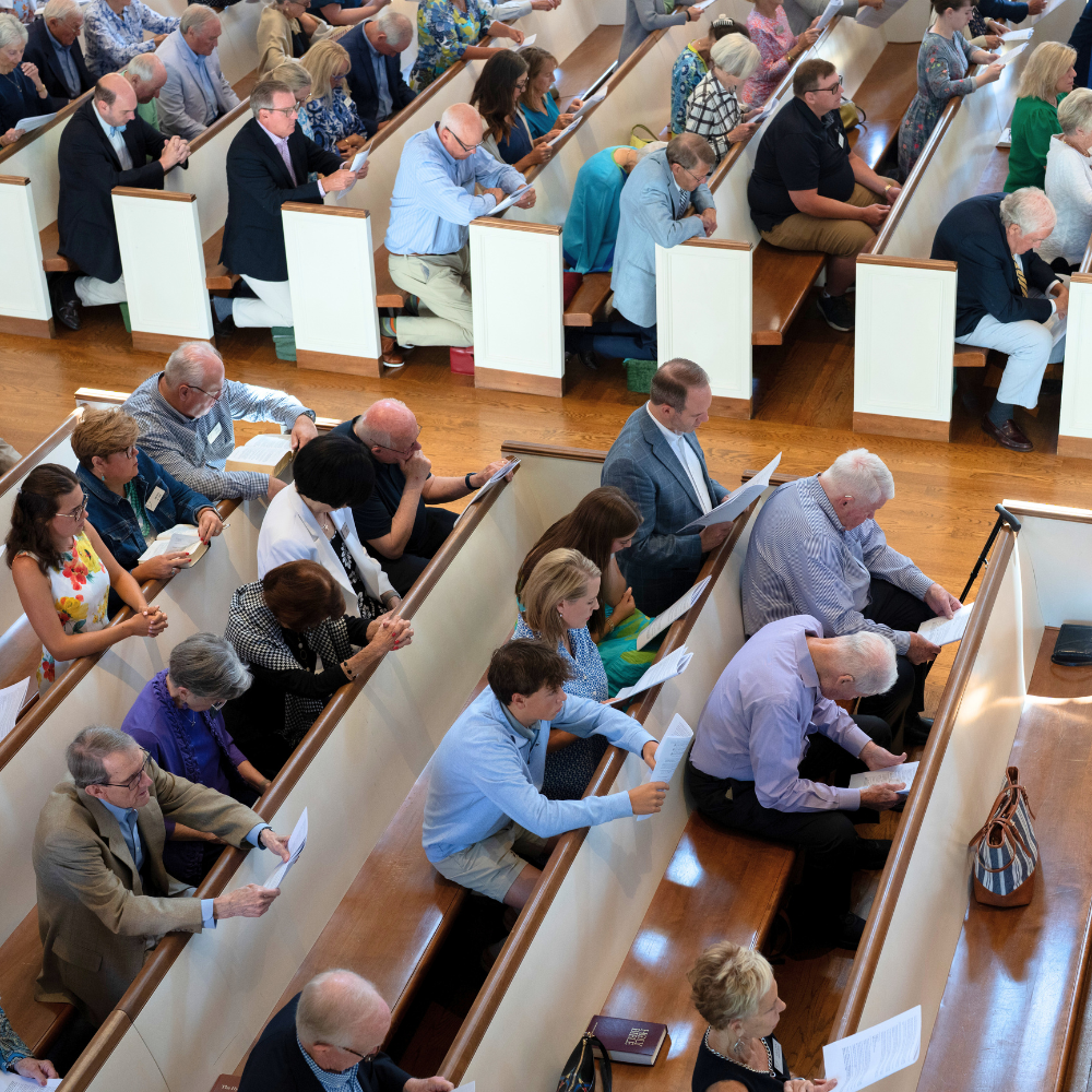 Congregants seated in the nave during worship.
